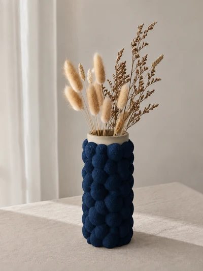 Puffra Bicolor en Azul Oscuro Blanco Hueso